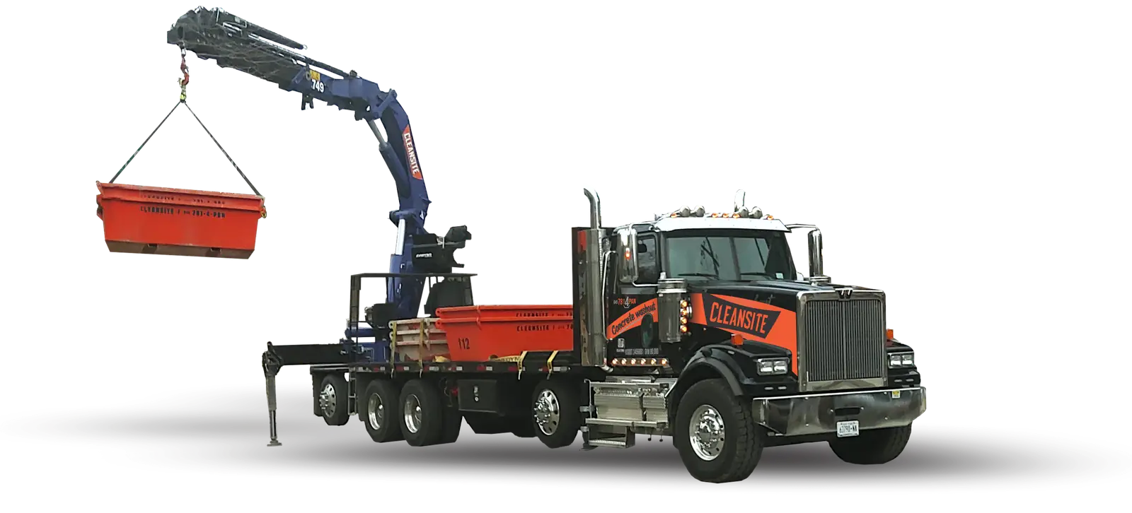 CleanSite boom truck lifting a concrete washout container
