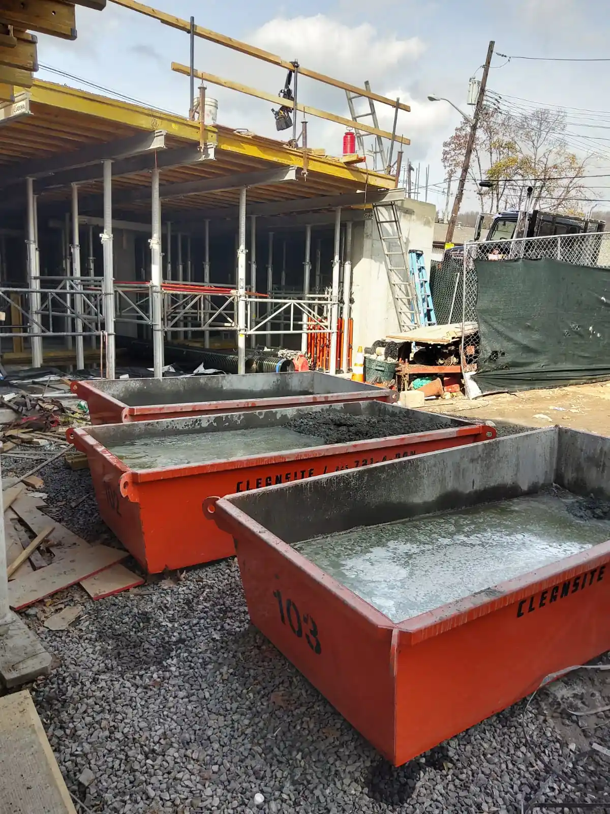 CleanSite pans filled with washout at a building site